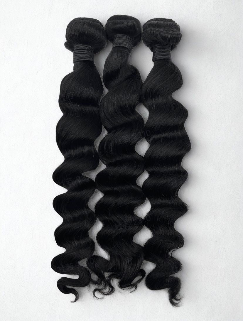 Loose wave wefted human hair bundle - curly
