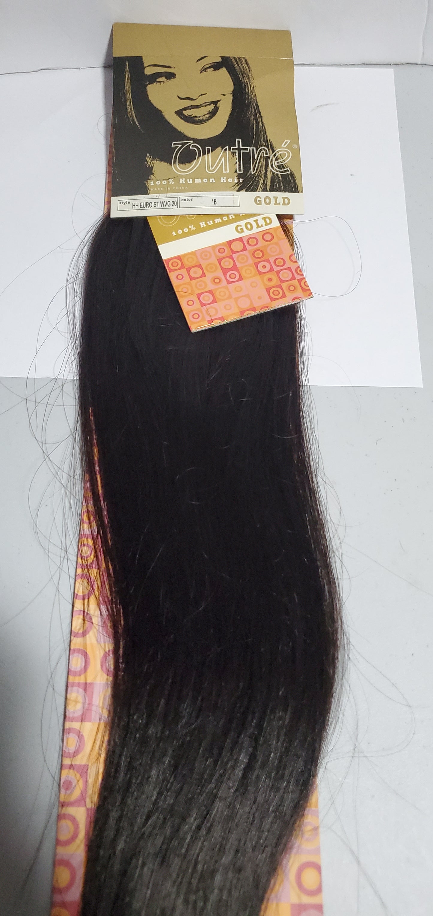 Human hair Euro straight weave for sew-in; 20 inch by Outre Gold image 0