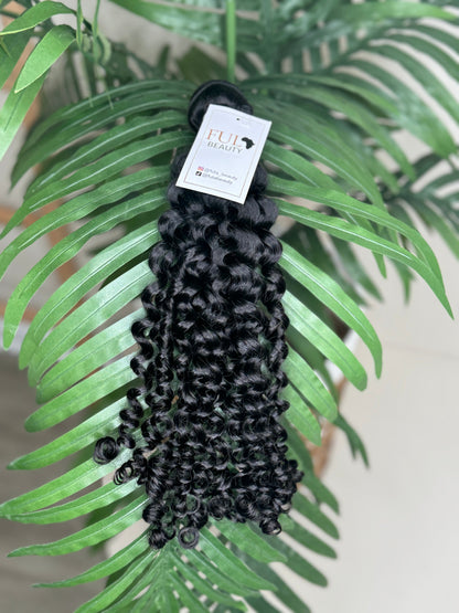 Italian curl wefted human hair bundle.