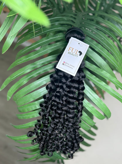 Italian curl wefted human hair bundle.