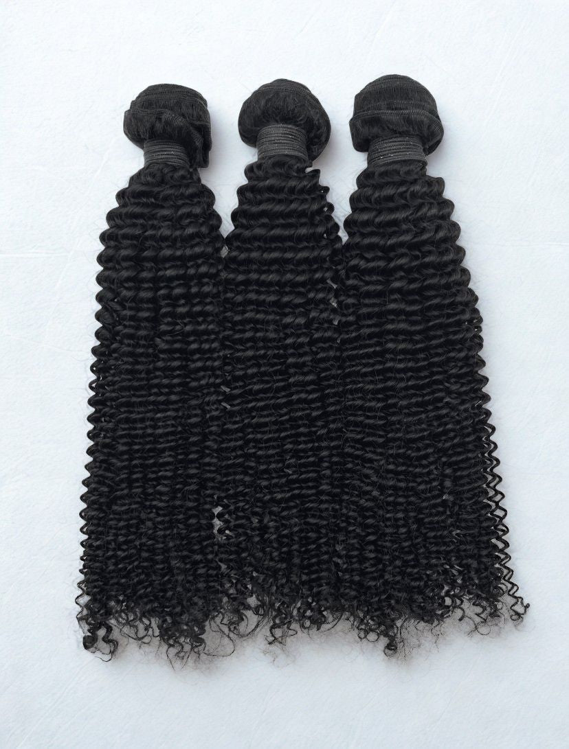 Kinky curly wefted human hair bundle for sew-ins.