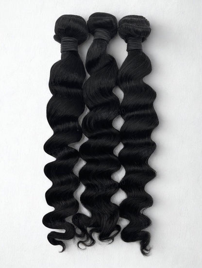 Loose wave wefted human hair bundle - curly