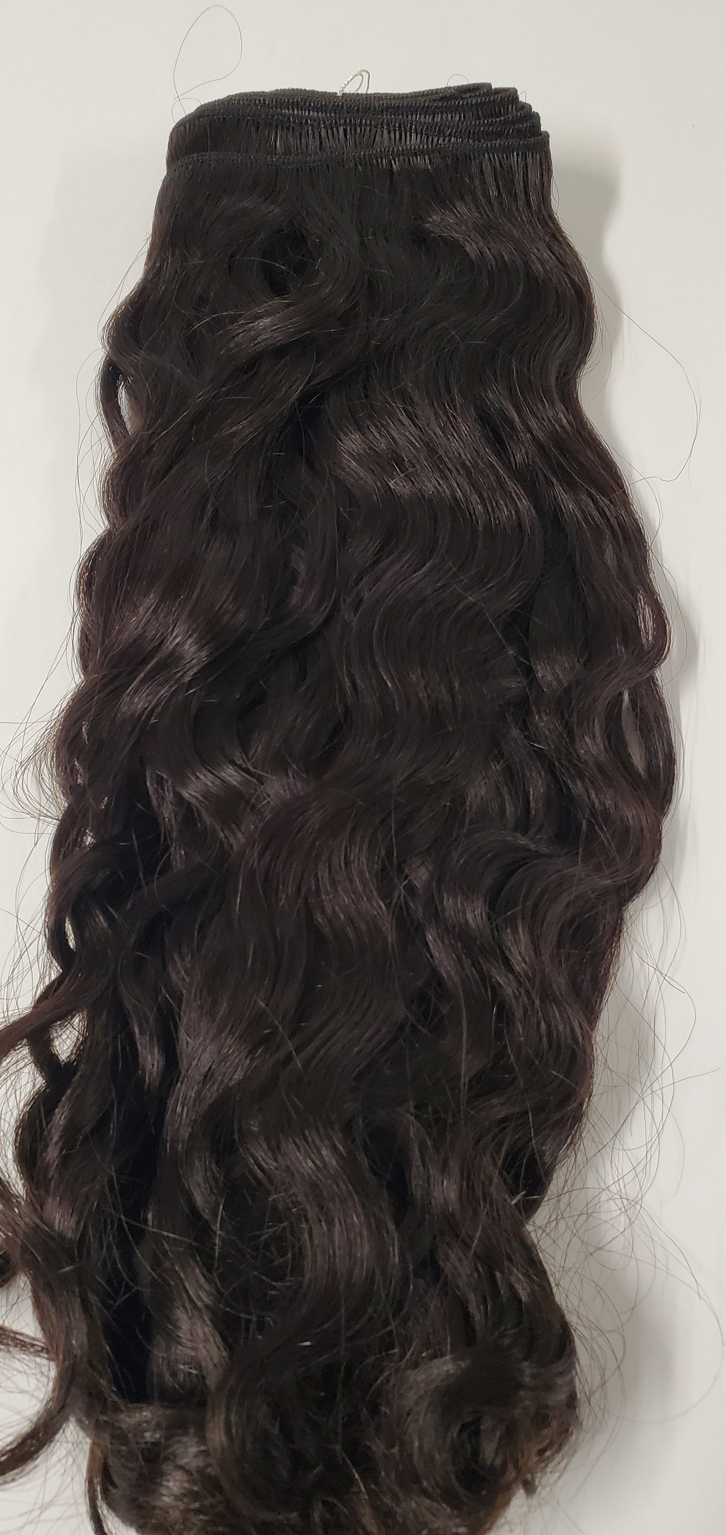 Human hair Spanish wave curly weave; platinum neutralized sew-in weft. image 0