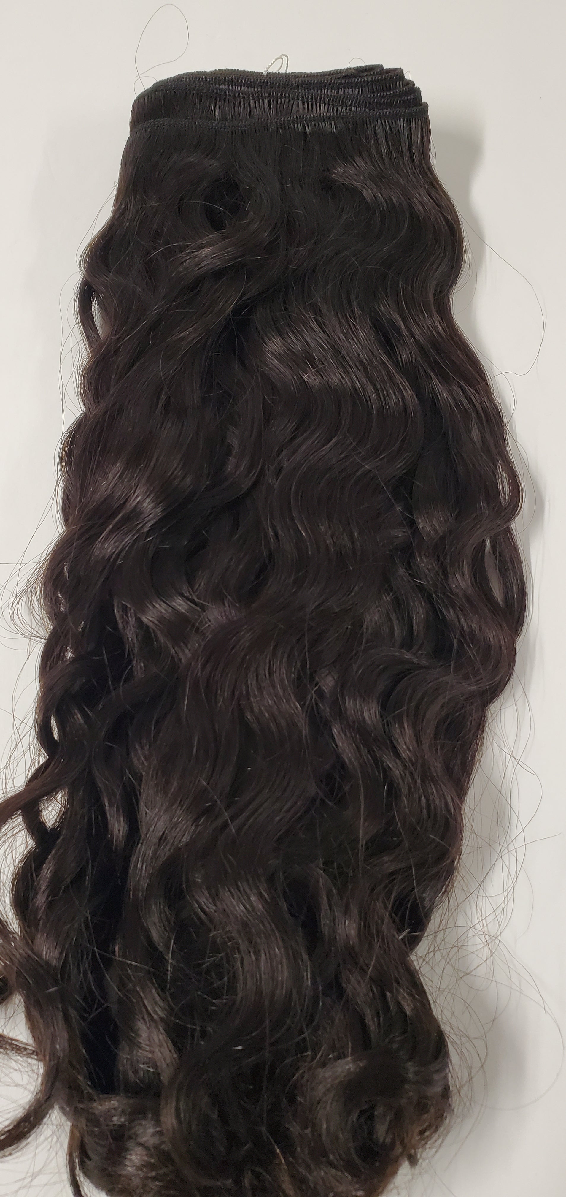 Human hair Spanish wave curly weave; platinum neutralized sew-in weft. image 0